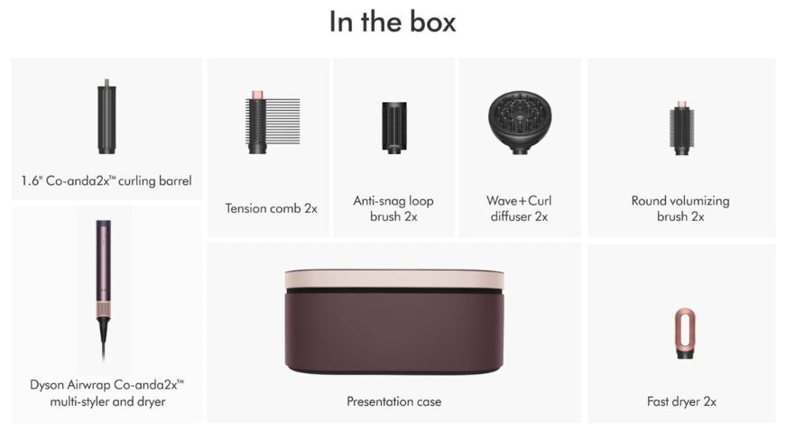 In the box layout showing included styling tools and accessories: two curling barrels, two tension combs, two anti-snag loop brushes, two wave and curl diffusers, two round volumizing brushes, a presentation case, and a fast dryer, with a Dyson Airwrap Co-anda2 multi-styler and dryer pictured.
