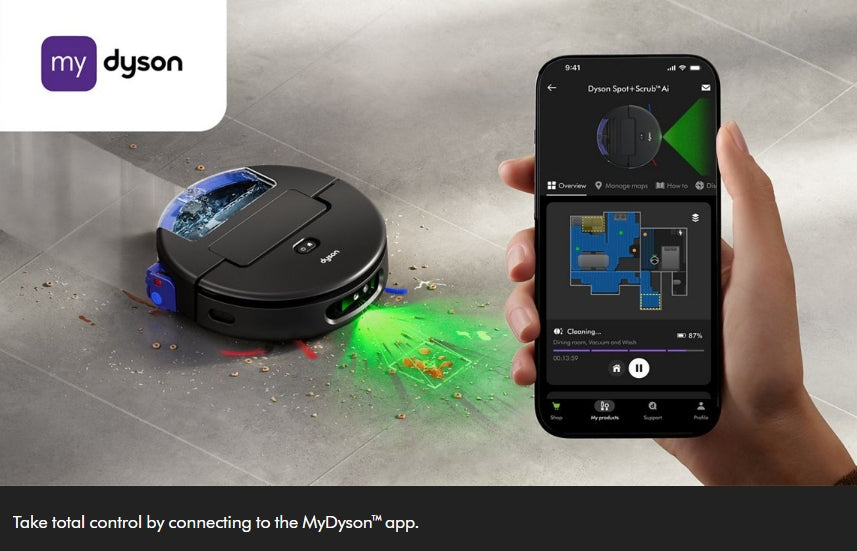 A Dyson robot vacuum cleaner is shown on a gray tiled floor, emitting a green laser light, while a human hand holds a smartphone displaying the MyDyson app. The MyDyson logo is visible in the top left corner.