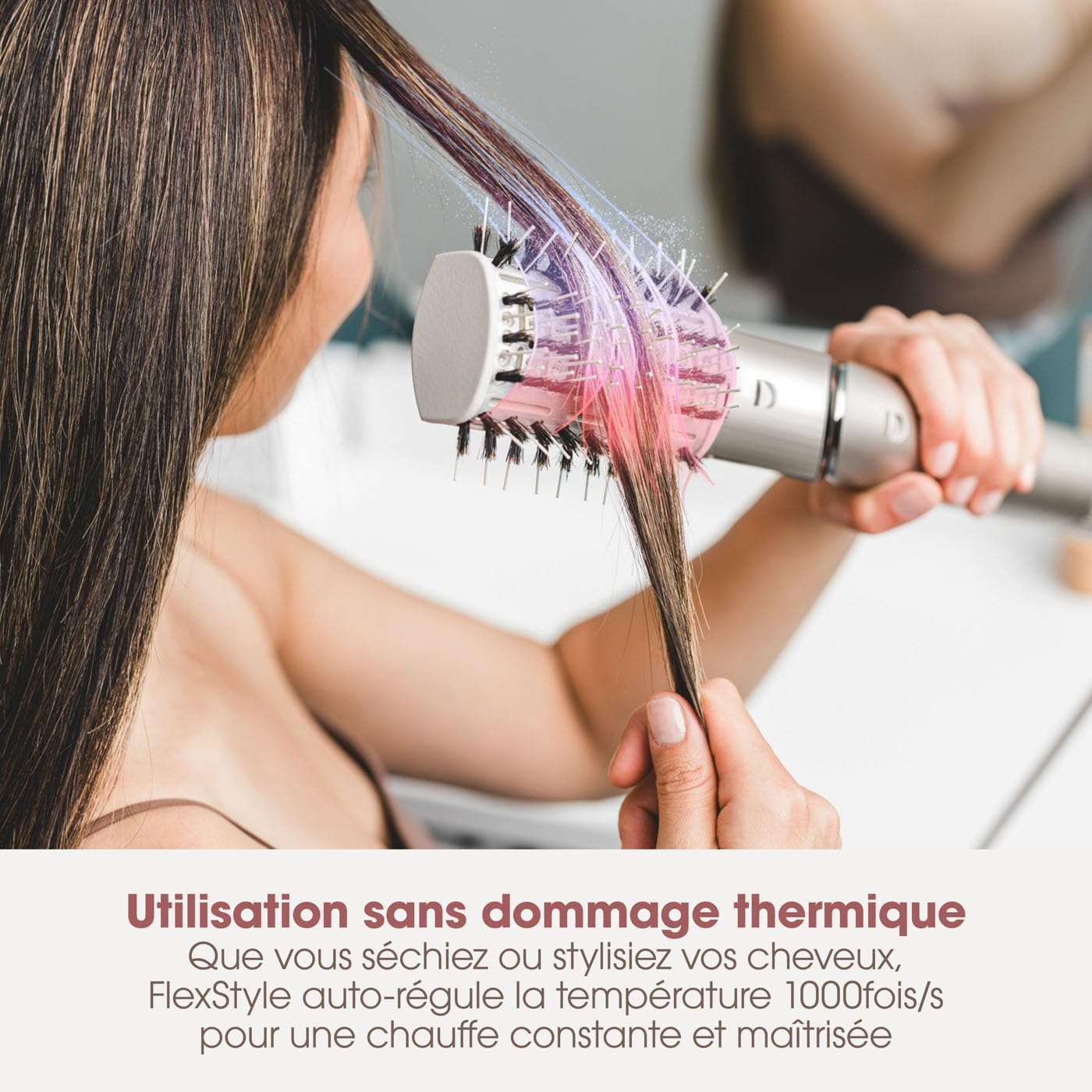 Person using a hair styling tool on their hair with text about thermal damage-free usage.