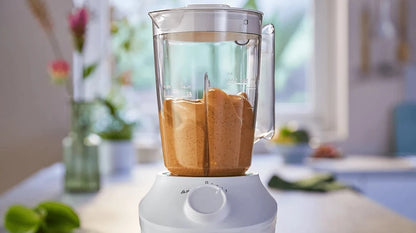 Taghareed Philips 3000 Series white blender with 1.9L jar, 450W motor, ProBlend technology, and stainless steel blades.