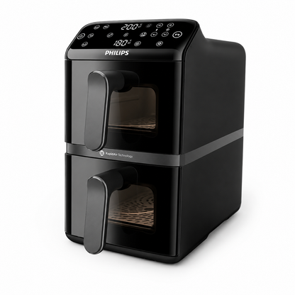 Taghareed Philips Airfryer 4000 Series dual basket stacked design with clear windows showing broccoli and chicken cooking.
