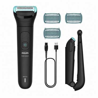Taghareed Philips Body Groomer 5000 Series BG5475/15, black, with 3 trimming combs, USB charging cable, and back attachment.