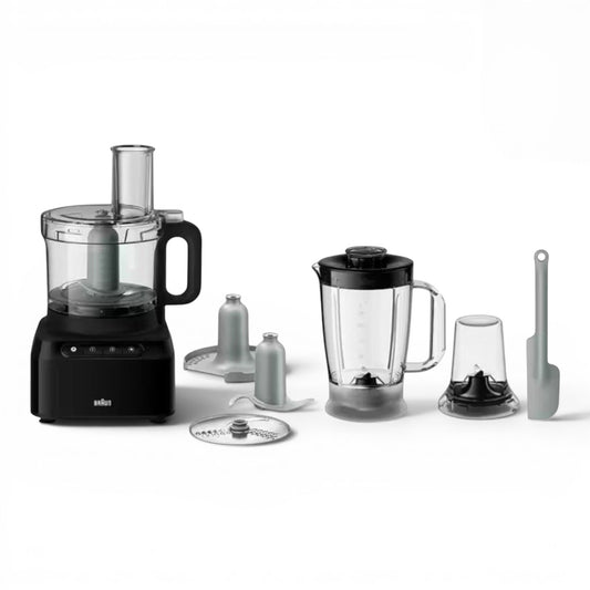 Braun PurEase Food Processor FP3132BK in black, featuring a compact design with multiple attachments including a blender jug, chopping blade, and slicing disc.