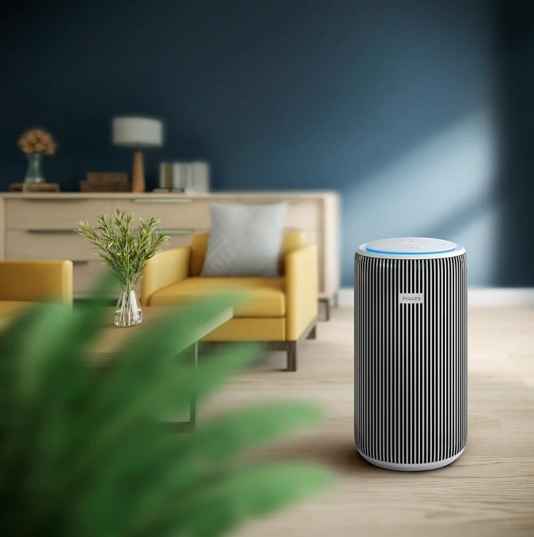 Philips PureProtect 3200 Series AC3220/10 air purifier with Double Fan technology and HEPA filter, in a modern living room.