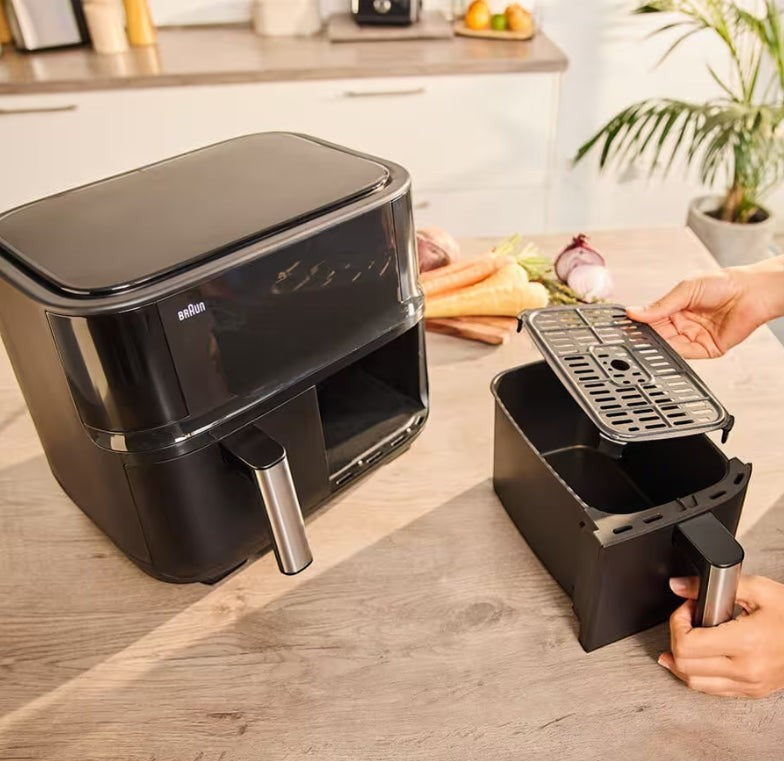 Taghareed Braun TwinCook 3 dual-basket air fryer in black, with removable basket and rack.