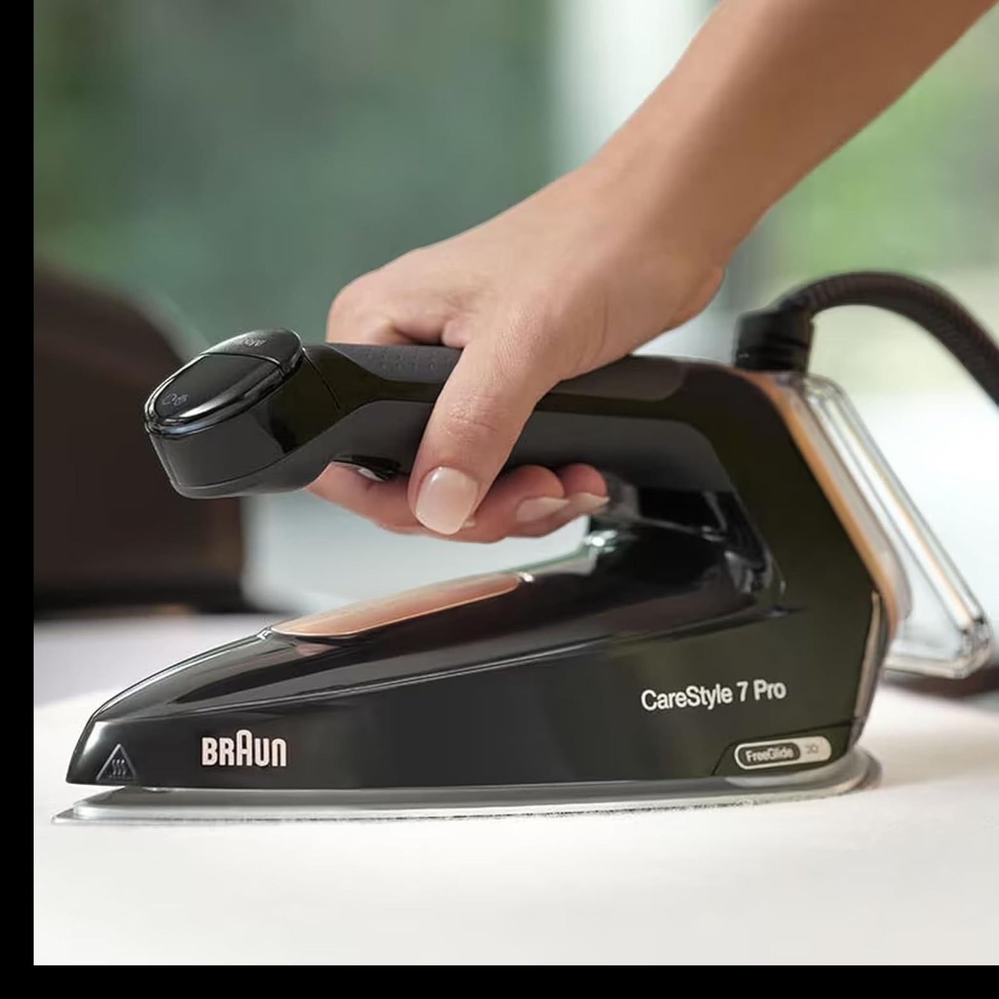 Braun CareStyle 7 Pro steam generator iron in black with copper accents, featuring FreeGlide 3D technology and iCare Mode.