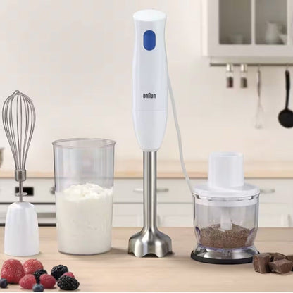 Taghareed Braun MultiQuick 1 hand blender in white with stainless steel shaft, whisk attachment, beaker, and chopper accessory.