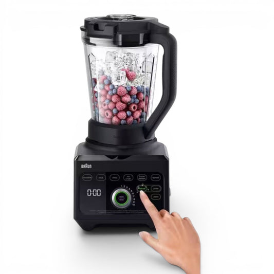 Taghareed Braun PowerBlend 9 JB9040BK black 1600W blender with 3L Tritan jug filled with ice and berries, digital display, and touch controls.