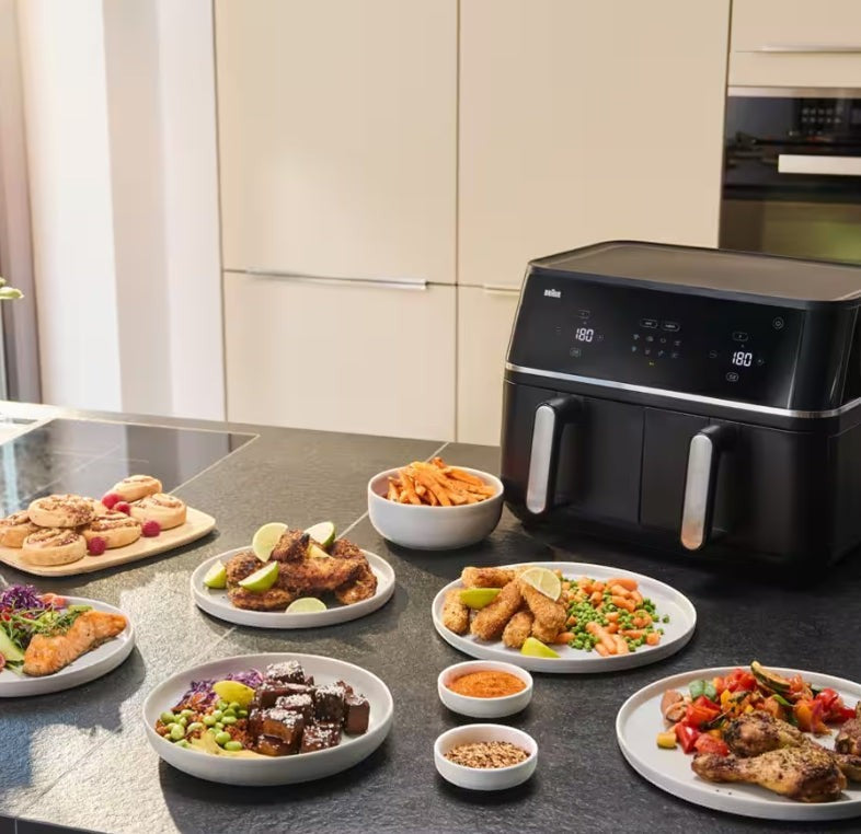 Taghareed Braun TwinCook 5 TD5030IBK black dual-basket air fryer with various meals