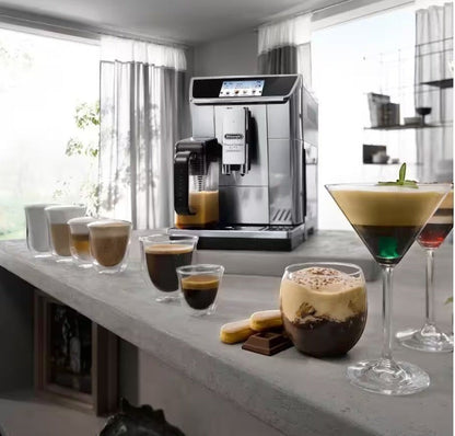 Taghareed De’Longhi PrimaDonna Elite stainless steel automatic coffee machine with touch screen, making various coffee drinks.