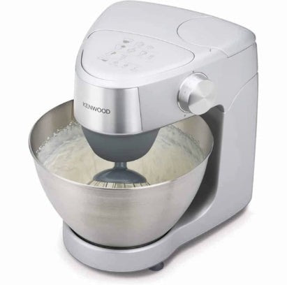 Taghareed silver Kenwood Prospero+ stand mixer with stainless steel bowl, whisk attachment, and cream mixture.