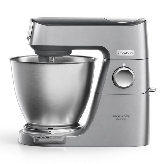 Taghareed Kenwood Titanium Chef Baker XL stand mixer in silver, with a 7L stainless steel bowl and planetary mixing system.