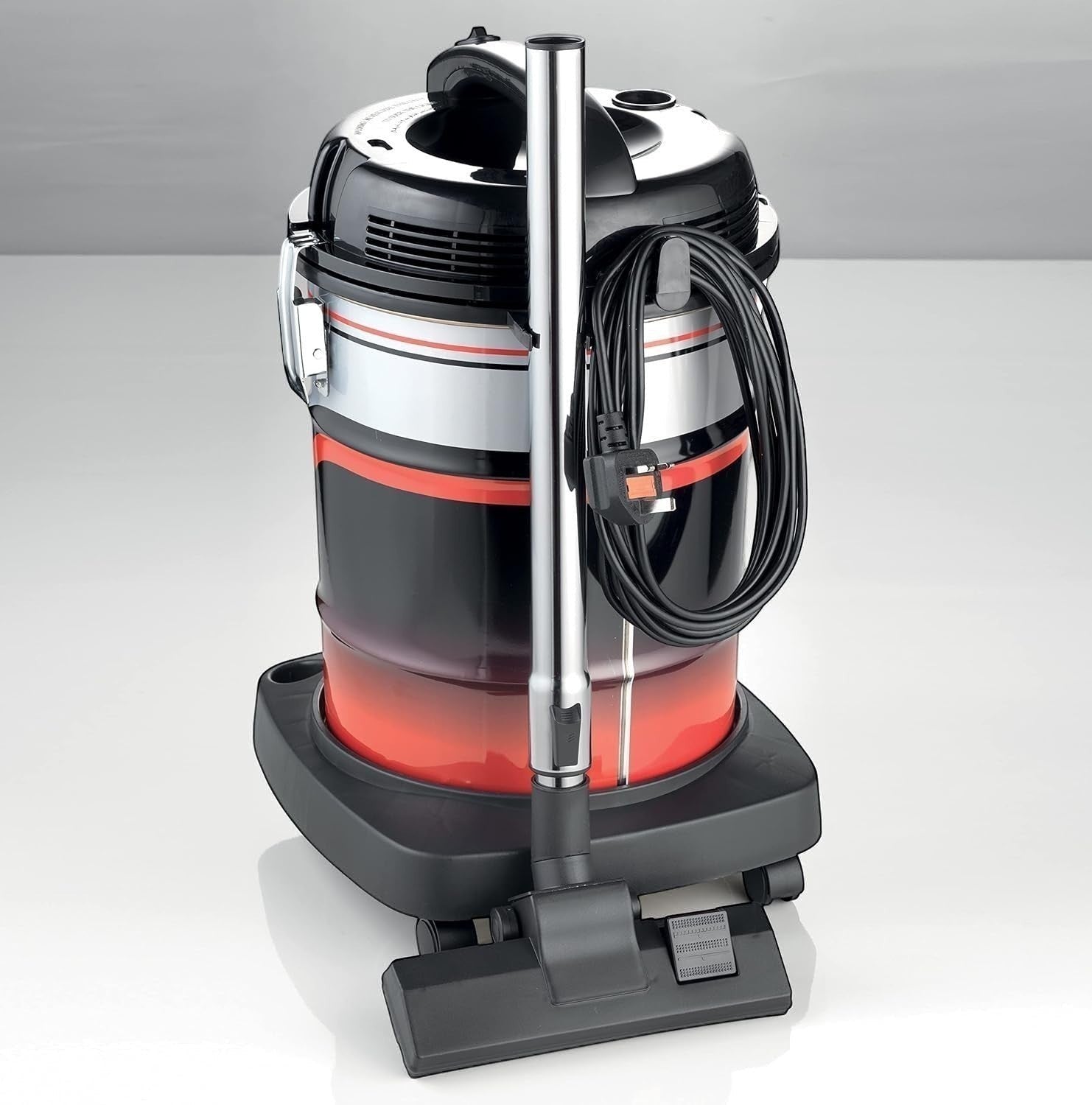 Taghareed Kenwood 2200W 25L Wet & Dry drum vacuum cleaner with floor brush attachment. Black, red, and silver.