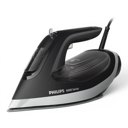 Taghareed Philips 6000 Series DST6120/86 steam iron, black and silver, with 2600W power and SteamGlide Plus soleplate.