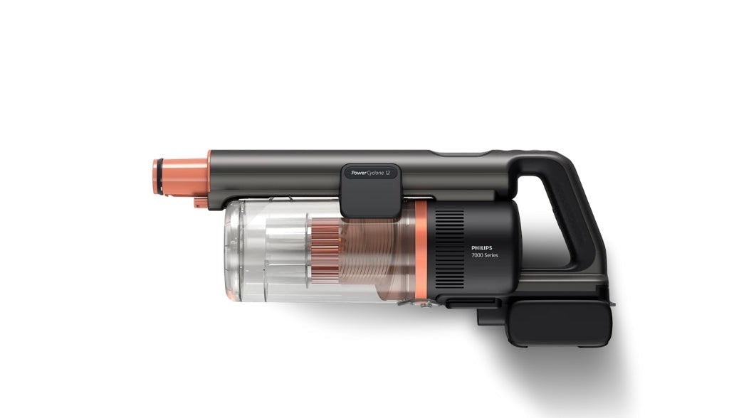 Taghareed Philips 7000 Series Cordless Vacuum Aqua XC7055/01, dark grey with orange accents, features PowerCyclone 12 technology.