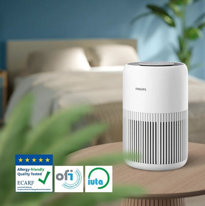 Taghareed Philips PureProtect Mini 900 Series AC0920/10 white compact air purifier with HEPA filter, ideal for bedrooms.
