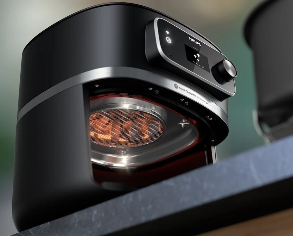 Taghareed Philips Airfryer 7000 Series XXL Connected HD9880/90, black, with Rapid CombiAir technology and digital display.