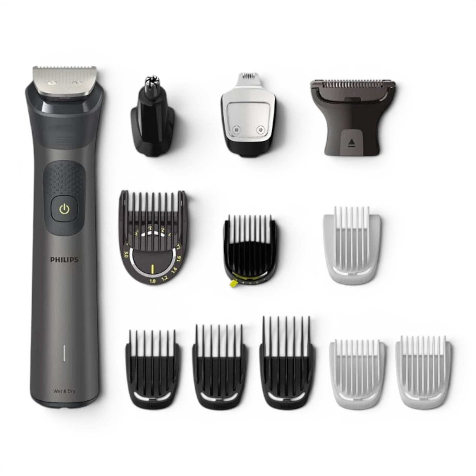 Taghareed Philips All-in-One Trimmer 7000 MG7920/15 with 13 attachments, including beard combs, body groomer, nose trimmer, and hair clippers.