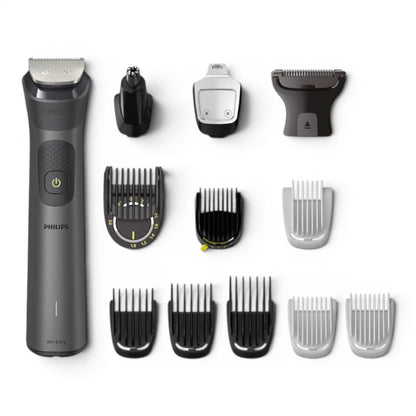 Taghareed Philips All-in-One Trimmer 7000 MG7920/15 with 13 attachments, including beard combs, body groomer, nose trimmer, and hair clippers.