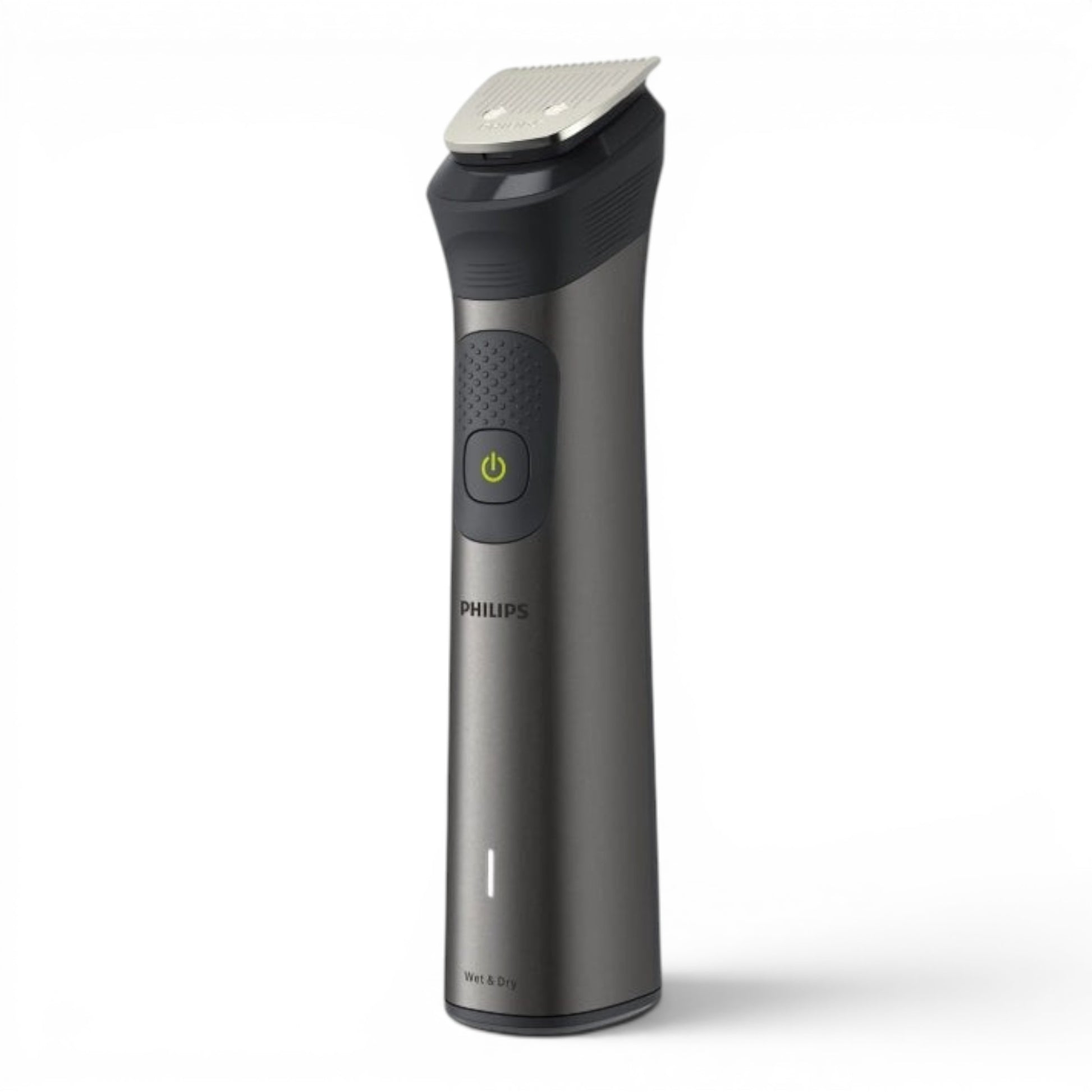 Taghareed Philips All-in-One Trimmer 7000 MG7920/15, a dark grey grooming tool with a silver trimmer head and a green power button.