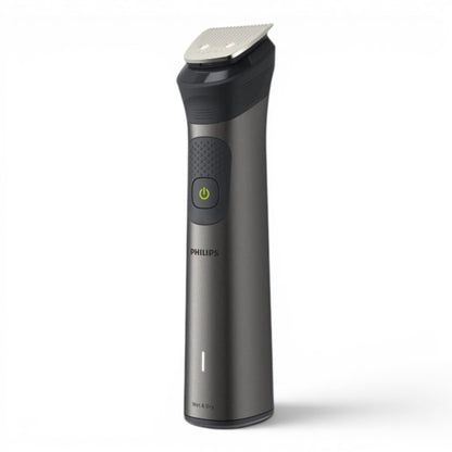 Taghareed Philips All-in-One Trimmer 7000 MG7920/15, a dark grey grooming tool with a silver trimmer head and a green power button.