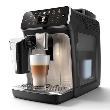 Taghareed Philips 5500 Series fully automatic espresso machine with LatteGo system, brewing a latte macchiato. Features a TFT display and ceramic grinder.