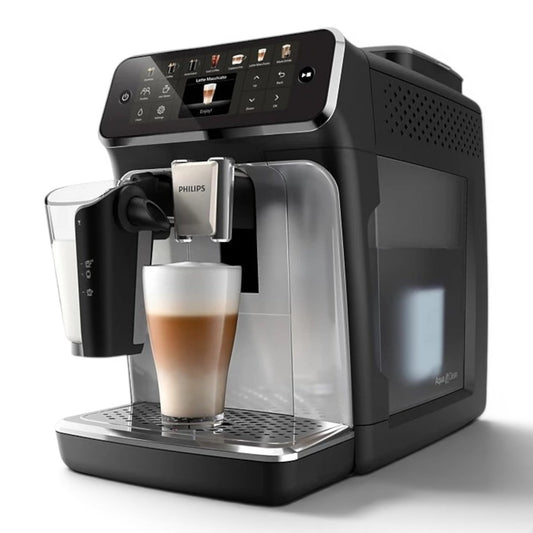 Taghareed Philips 4400 Series fully automatic espresso machine with LatteGo system, making a latte macchiato.