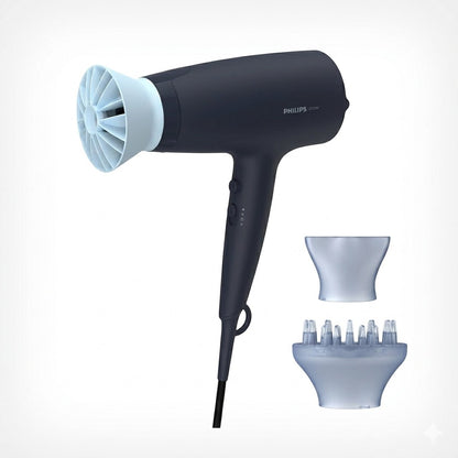 Taghareed Philips 3000 Series dark grey hair dryer with ThermoProtect attachment, concentrator nozzle, and diffuser.