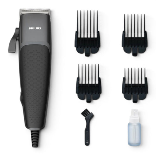 Taghareed Philips Hairclipper Series 3000 HC3100/13 corded hair clipper with 4 combs, cleaning brush, and oil bottle.