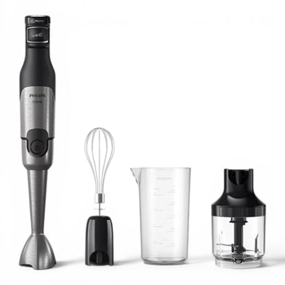 Taghareed Philips 5000 Series hand blender in silver and black, with whisk, beaker, and chopper attachments.