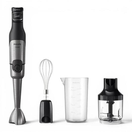 Taghareed Philips 5000 Series hand blender in silver and black, with whisk, beaker, and chopper attachments.