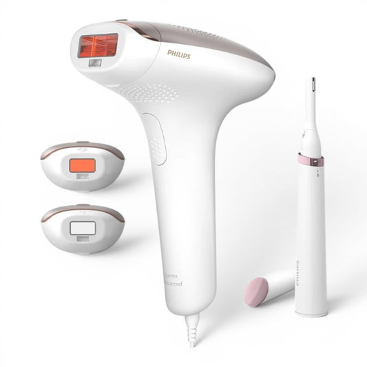 Taghareed Philips Lumea Advanced IPL 7000 Series BRI923/60 hair removal device with 3 attachments and a trimmer.