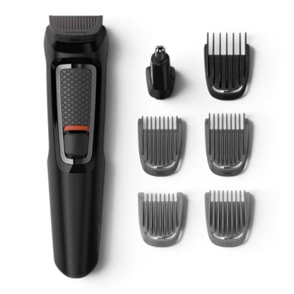 Taghareed Philips Multigroom Series 3000 MG3720/33 black grooming kit with 7 attachments including trimmer, nose/ear trimmer, and combs.