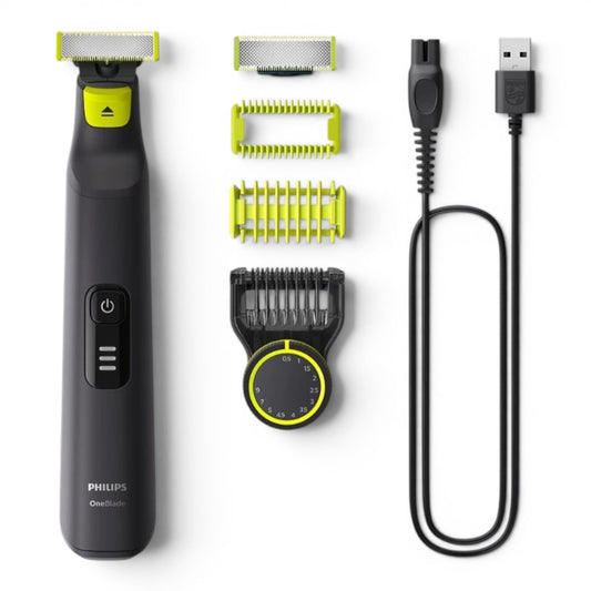 Taghareed Philips OneBlade Pro QP6542/10 electric trimmer with multiple attachments and USB charging cable. Black and neon green.