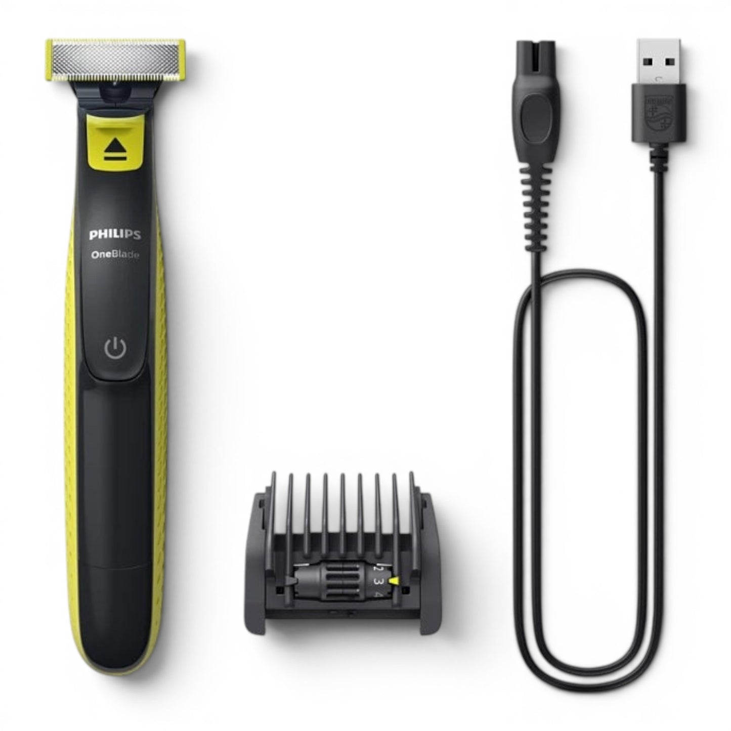 Taghareed Philips OneBlade QP2724/20 electric trimmer with yellow accents, USB charging cable, and 5-in-1 comb attachment.