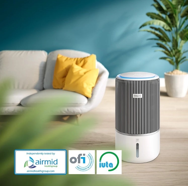 Taghareed Philips PureProtect Water 3400 Series AC3420/10 air purifier and humidifier with black and white striped design.