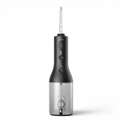 Taghareed Philips Sonicare Cordless Power Flosser 3000 HX3826/33, black oral irrigator with 3 modes and transparent water reservoir.
