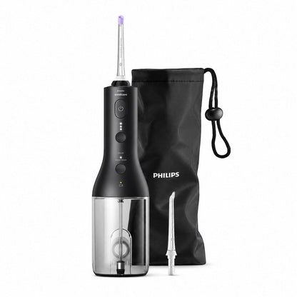 Taghareed Philips Sonicare Cordless Power Flosser 3000 HX3826/33, black oral irrigator with 3 modes and travel bag.