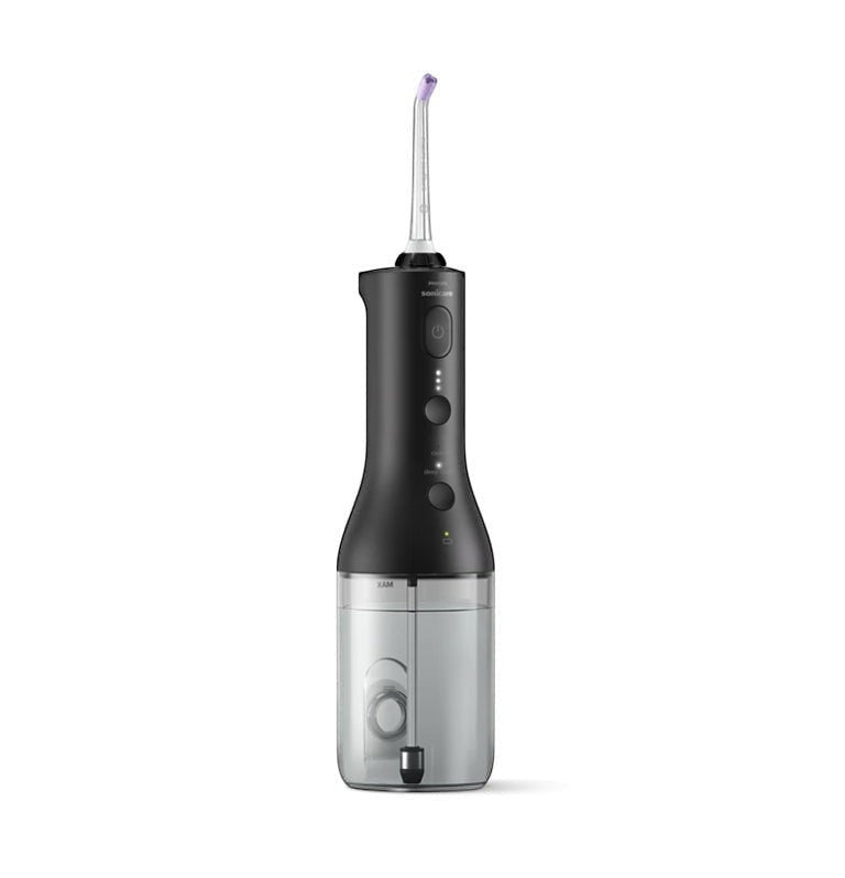 Taghareed Philips Sonicare Cordless Power Flosser 3000 HX3826/33 in black, with 3 modes for oral hygiene. Features a water reservoir and nozzle.