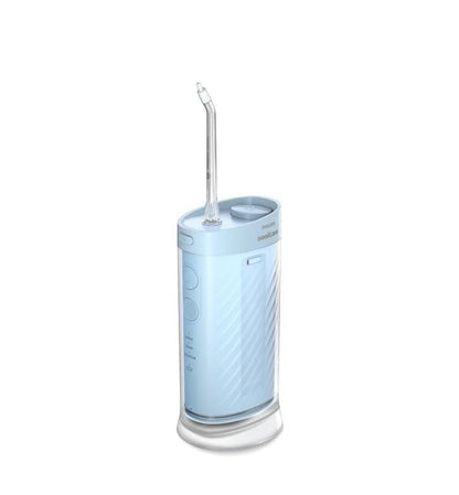 Taghareed Philips Sonicare cordless water flosser in light blue with 3 cleaning modes and 360-degree rotating nozzle.