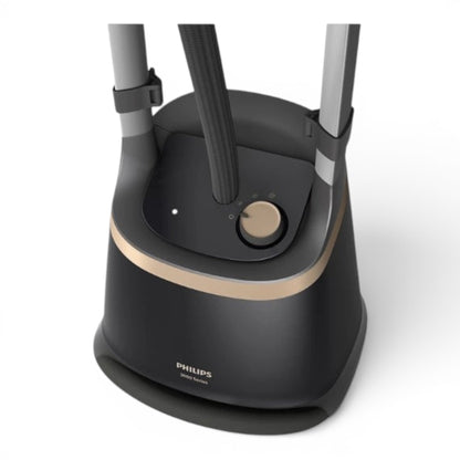 Taghareed Philips Stand Steamer 3000 Series with tilting StyleBoard, 2000W, 2L tank, removes wrinkles, odors, and 99.9% bacteria.